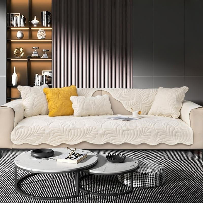 High-quality cotton sofa slipcover with beautiful leaf pattern, safeguarding against scratches and wear.