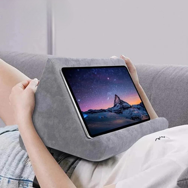 Soft ergonomic tablet stand pillow for hands-free reading & viewing phones.
