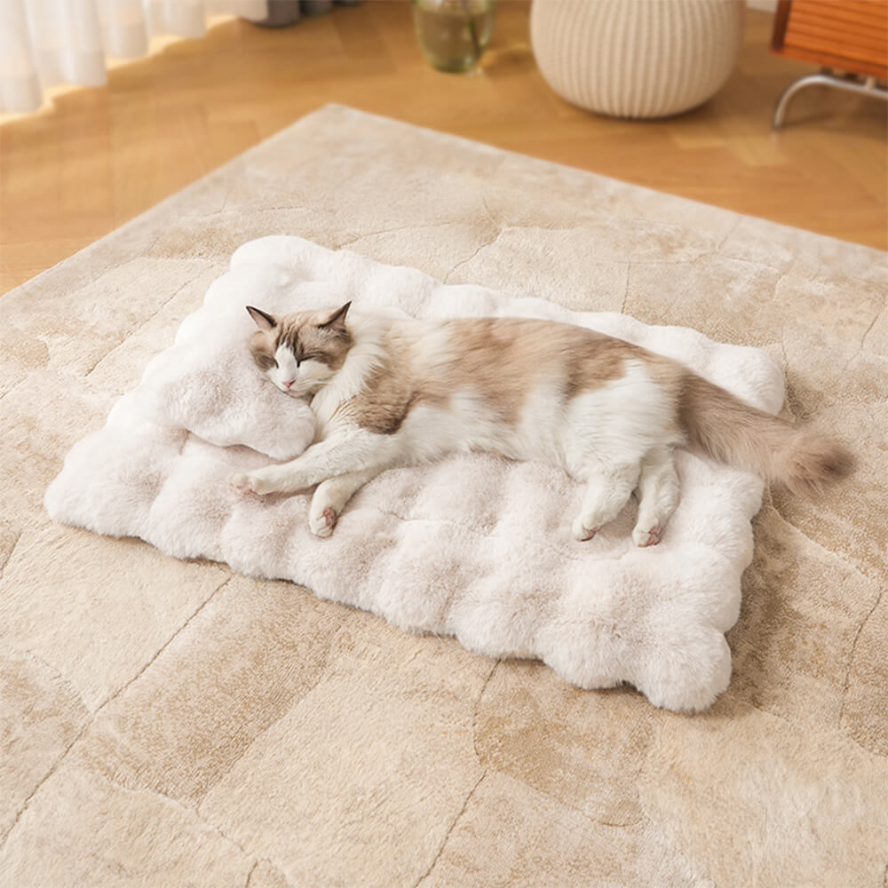 Faux rabbit fur pet mat demonstrating its thickness and softness, plush dog & cat bed