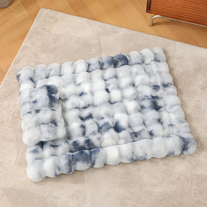 Lifestyle image of a pet mat: Faux rabbit fur bed with pillow for ultimate pet comfort