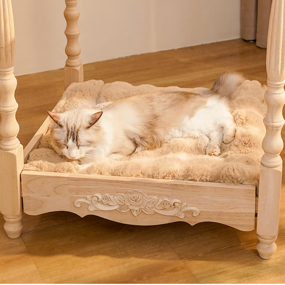 Cat napping on a plush faux rabbit fur pet bed, cozy mat with wave pattern pillow