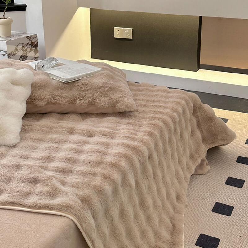 Gray faux rabbit fur non-slip fitted mattress cover, essential bedding for a cozy bedroom.