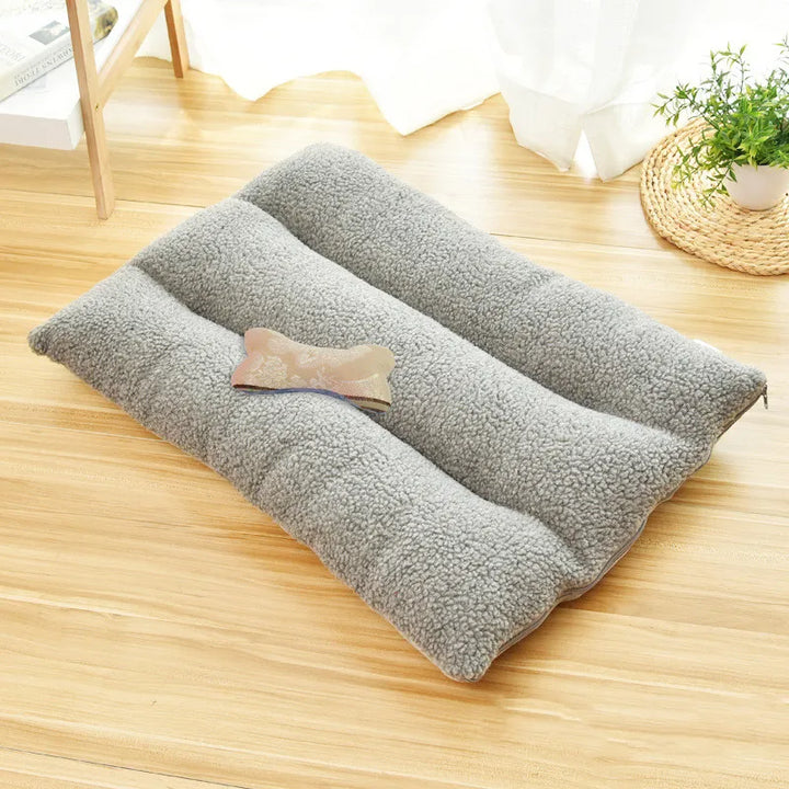 Indoor pet bed: plush fleece dog cushion, rectangular, providing cozy comfort for large dogs.