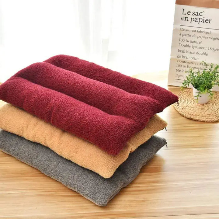Durable pet bed with a soft fleece top, designed for dog comfort and easy cleaning.