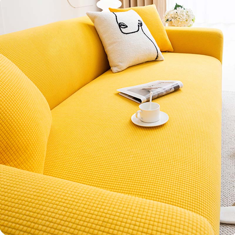 Soft fleece full-wrapped sofa protector cover in a serene living room setting, pet-friendly design