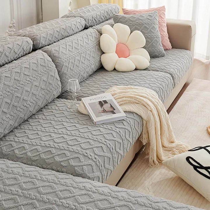 Unisex stretch couch cover, full wrap style for a snug fit, soft fleece material for comfort.