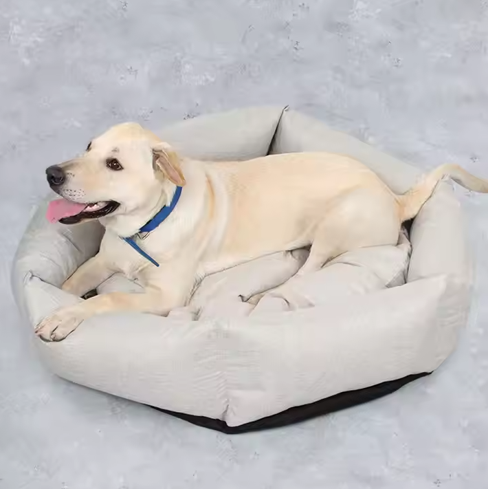 Soft grey dog bed with high edges for ultimate comfort and security, ideal for small to medium dogs.