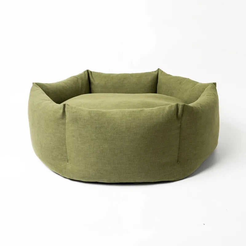 Luxurious dog bed featuring soft fabric and elevated bolster edges, perfect for dog comfort.