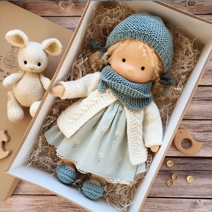 Organic cotton Waldorf doll, promoting imaginative play & providing soft comfort for toddlers.