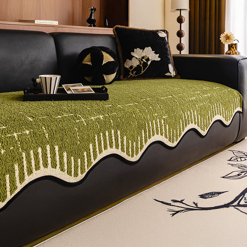 Beige plush sofa cover with wave edges, adding comfort and style to a living room.