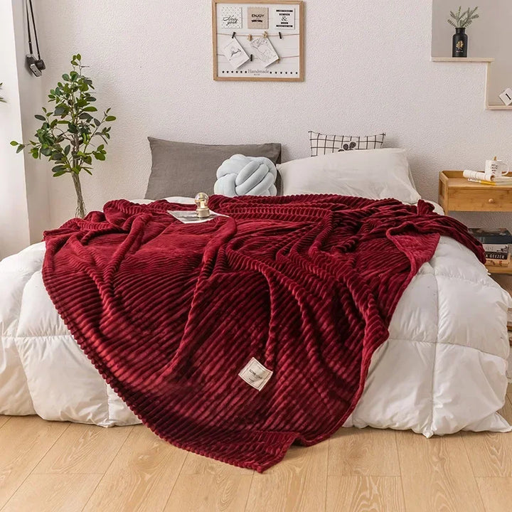 Unisex plush flannel blanket, ultra-soft and warm for comfortable relaxation.
