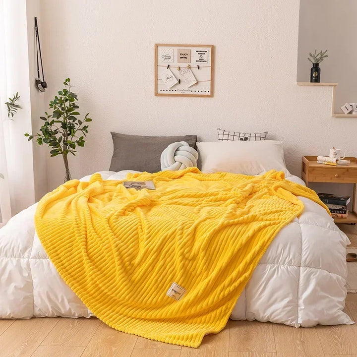 Thick plush flannel blanket, a cozy and soft addition to any bed or living space.