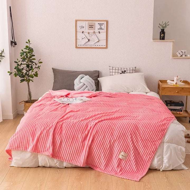 Warm flannel throw blanket, ideal for snuggling and enhancing cozy home decor.