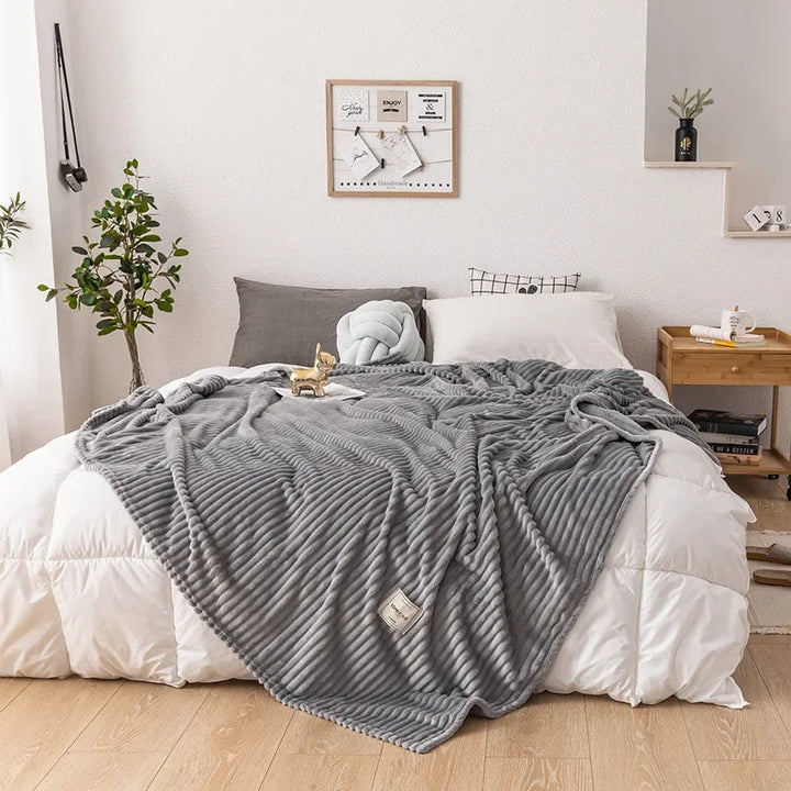 Plush flannel blanket offering ultimate softness, warmth, and cozy comfort for home.