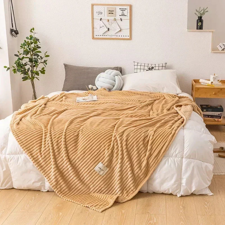 Comfortable unisex flannel blanket, a soft and warm throw for bed, sofa, or travel.