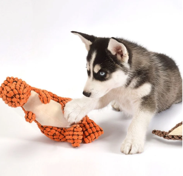 Ergonomic plush dinosaur dog toy, designed for comfort and extended play sessions