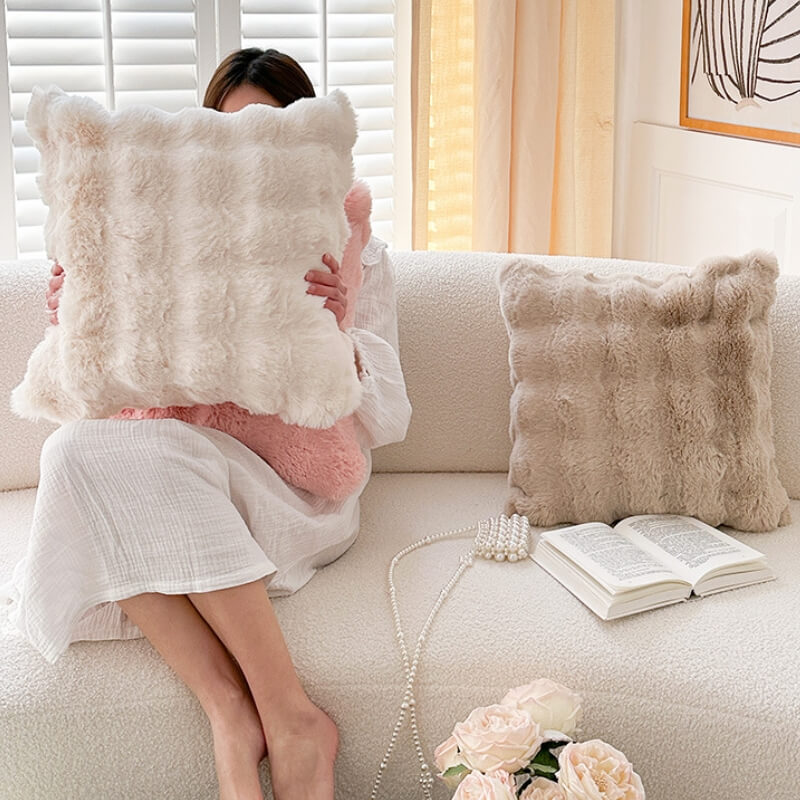 Stylish reversible plush sofa cushion in deep blue, a soft couch cover enhancing home decor
