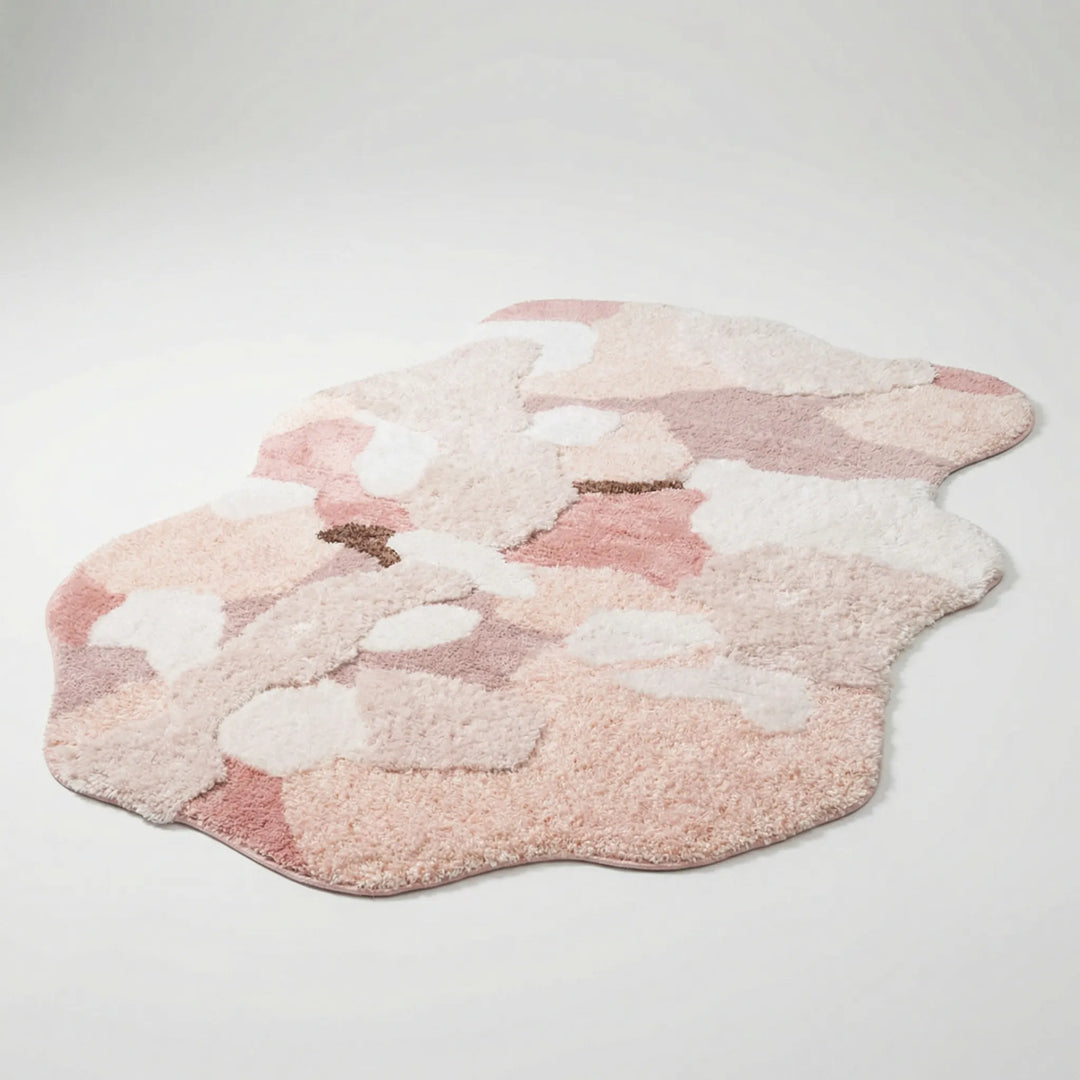 Flowique statement area rug with nature-inspired waves & organic floral design. Soft sculpted for serene home decor.