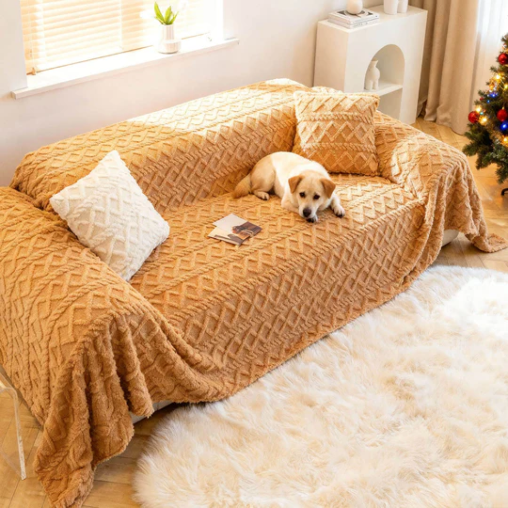 Beige shaggy furniture protector draped on a two-seater couch, emphasizing its soft, pet-friendly design.