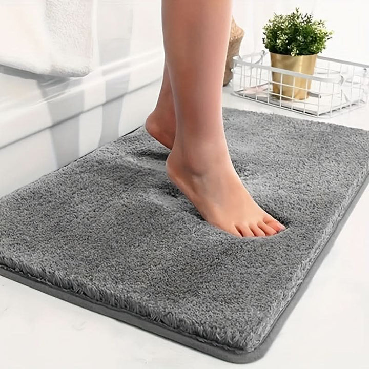 Soft, thick, highly absorbent non-slip bath mat for ultimate bathroom comfort & safety. Quick dry & washable floor mat.
