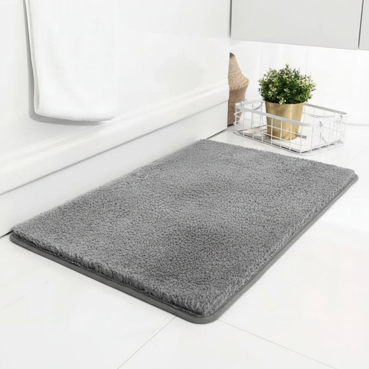 Luxurious thick & soft bath mat, highly absorbent for comfort. Non-slip anti-skid floor mat ensures safety on bathroom floors.