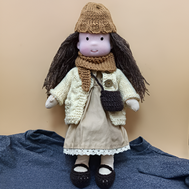 Natural wool Waldorf doll, handmade and soft, an ideal play friend and comfort doll.