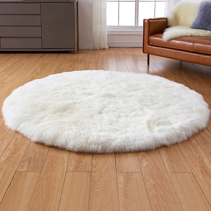 Soft white faux sheepskin round area rug, plush texture for cozy home decor
