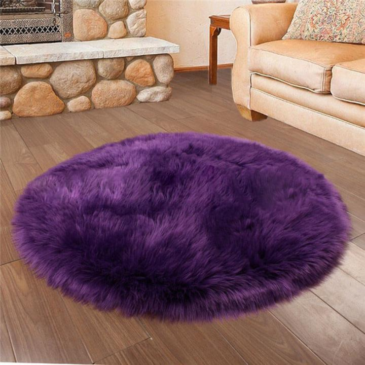 Detailed shot of the long fibers of a faux sheepskin rug, highlighting its softness