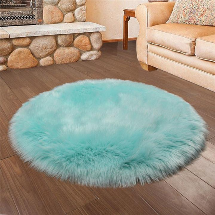 Kids' room adorned with a comfy round faux fur sheepskin rug, inviting play