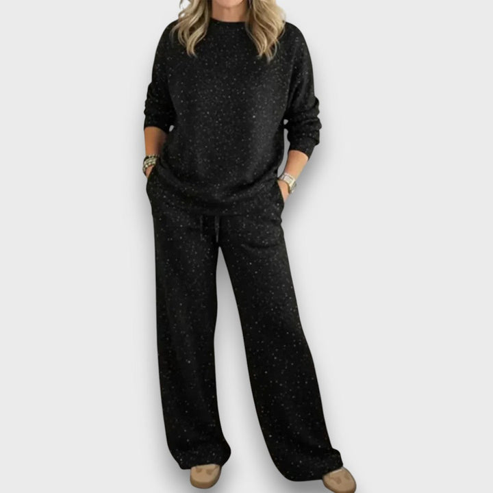 Comfortable black two-piece lounge set for women, a stylish and relaxed fit ideal for casual home wear.