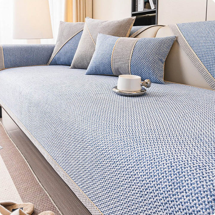 Multi-color striped woven sofa cover, breathable, durable, and non-slip for furniture protection.
