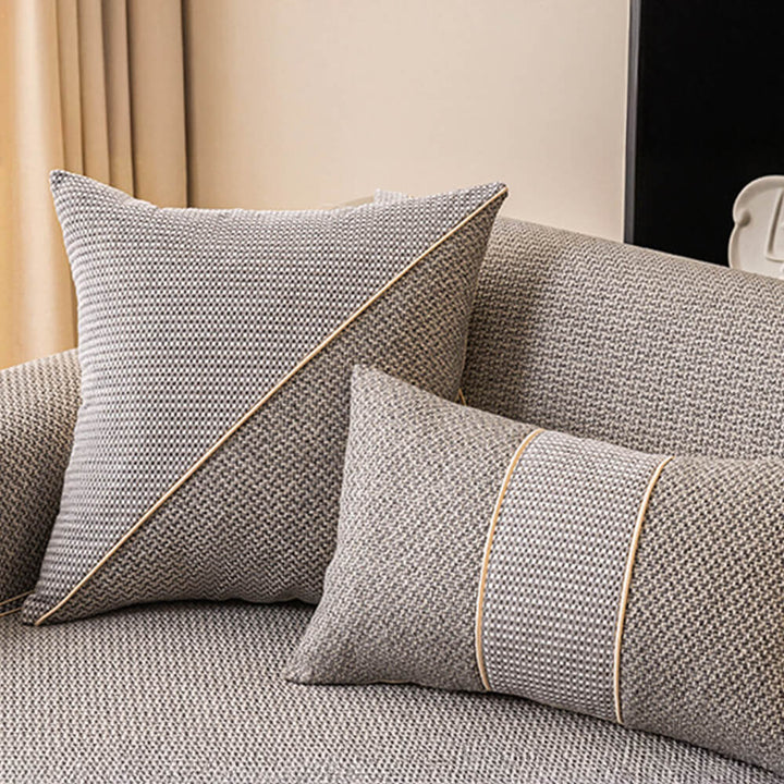 Green woven sofa cover, pet-friendly and non-slip, offering durable furniture protection.