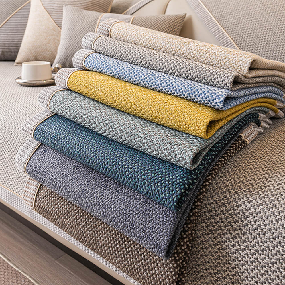 Brown woven sofa cover, breathable and non-slip, perfect for all-season living room use.
