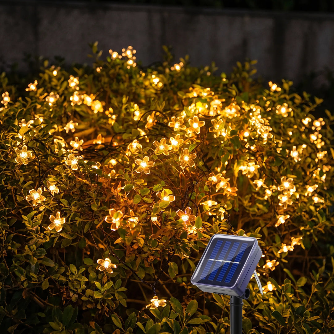 Solar blossom LED string lights, perfect for outdoor garden & patio decorative lighting.