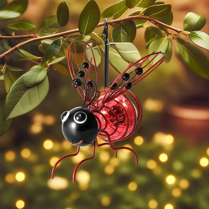 Durable solar bee figurine for outdoor, garden, and patio lighting decor, weather-resistant.