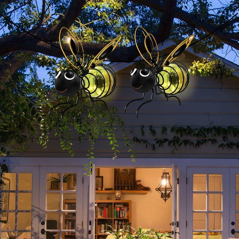Detailed bee figurine solar light, perfect for illuminating garden spaces and outdoor living areas.