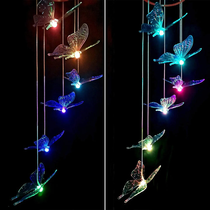 Butterfly solar-powered garden lights illuminating a patio area at night, creating an enchanting ambiance.