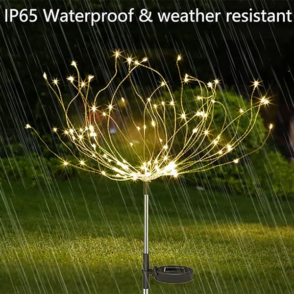 Waterproof solar firework garden lights sparkling in a lush green garden at dusk, outdoor lighting.