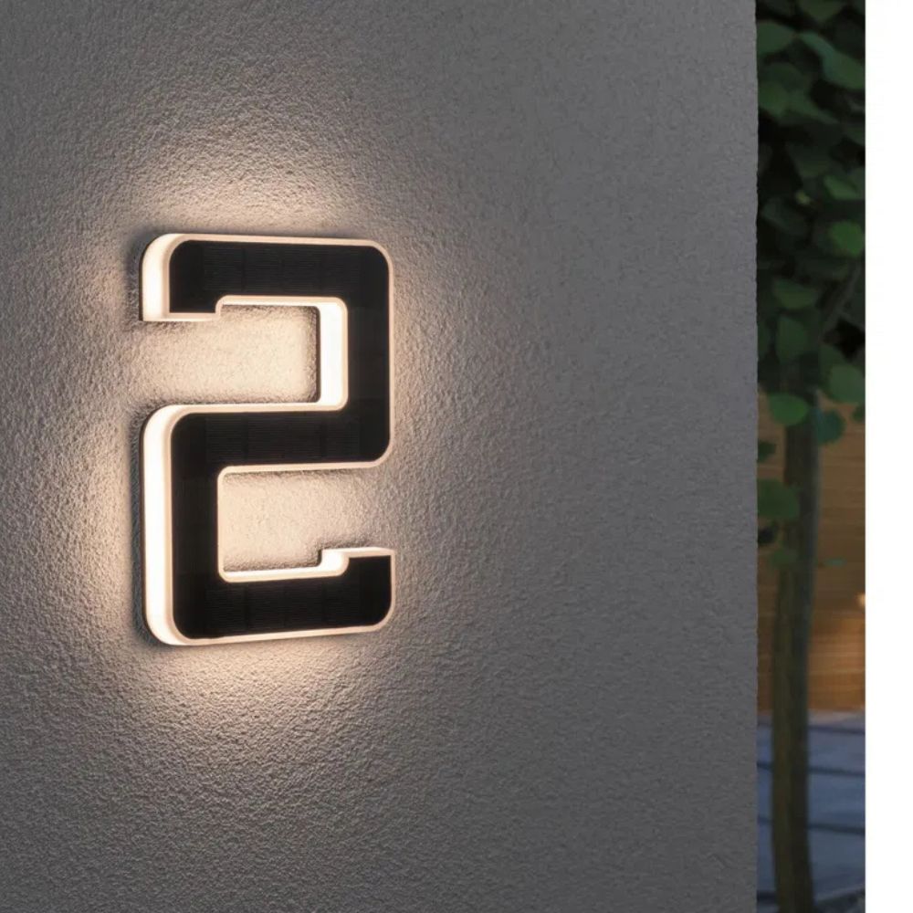 Modern solar house number, LED lit for dusk to dawn visibility, boosts curb appeal & safety.