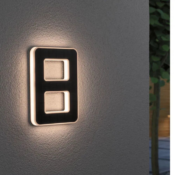 Dusk to dawn solar LED house number, perfect for enhancing curb appeal and outdoor safety.