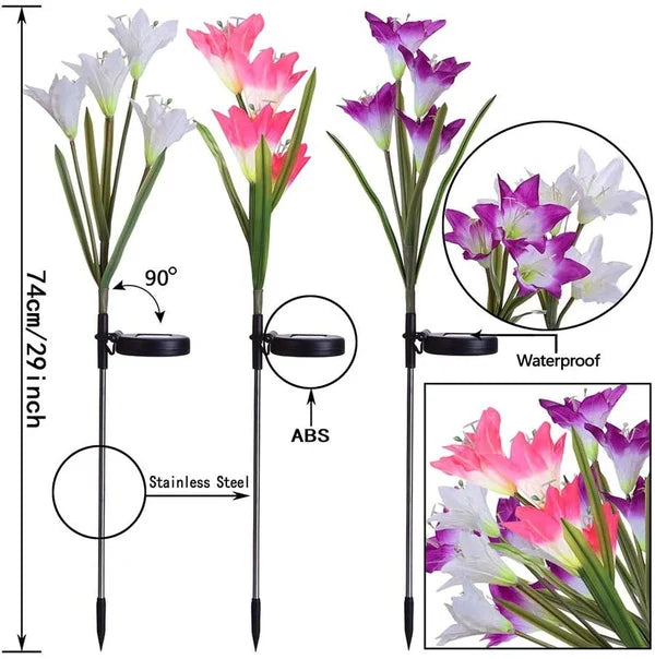 Vibrant color changing solar lily flower stake lights creating a festive atmosphere in a yard.