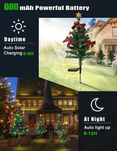 Set of solar-powered Christmas tree stake lights illuminating a garden at night, festive decor