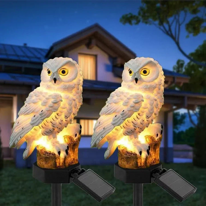 Charming owl solar garden light, an ideal decorative stake for patios and outdoor spaces.
