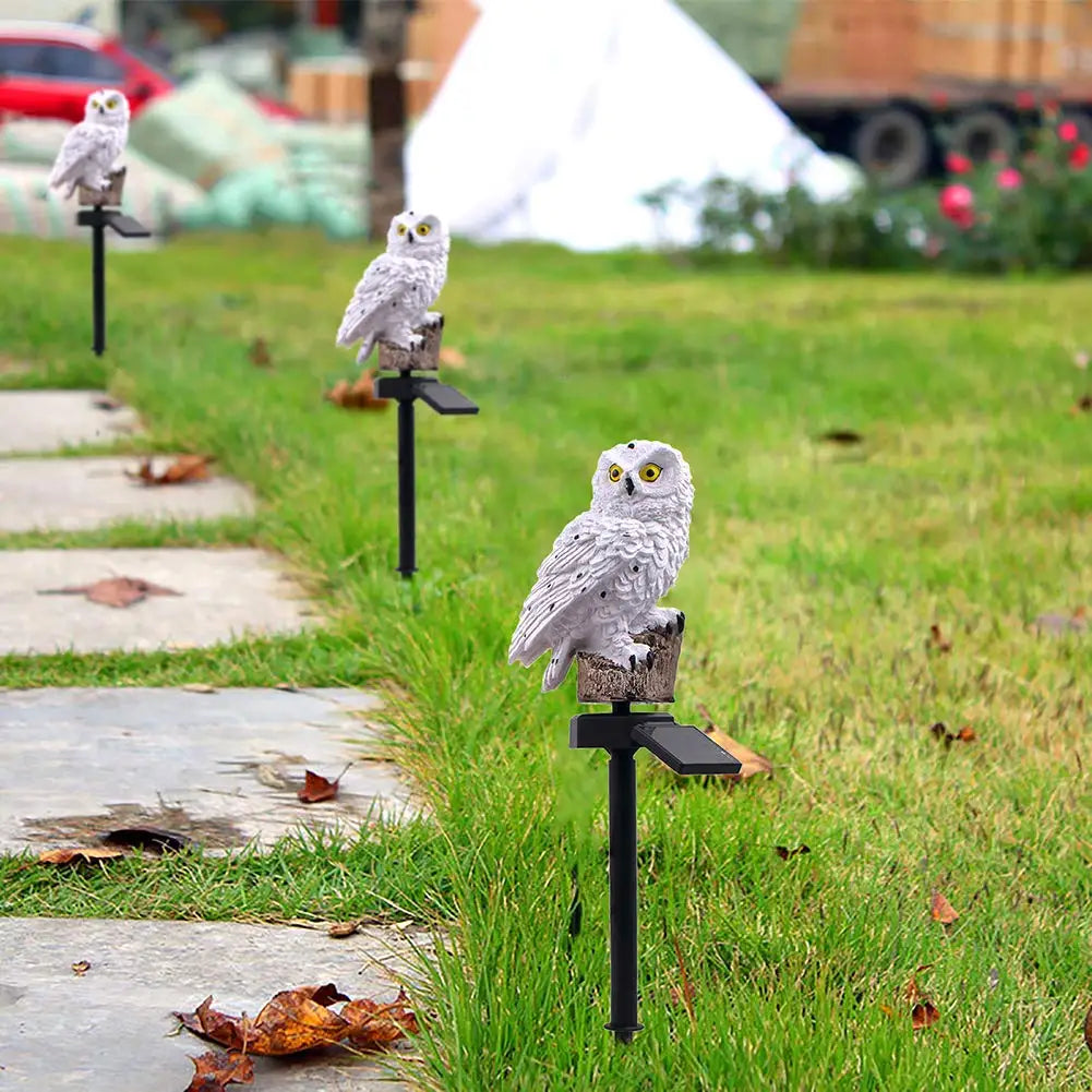 Whimsical solar powered owl LED light, excellent outdoor decor for gardens and pathways.
