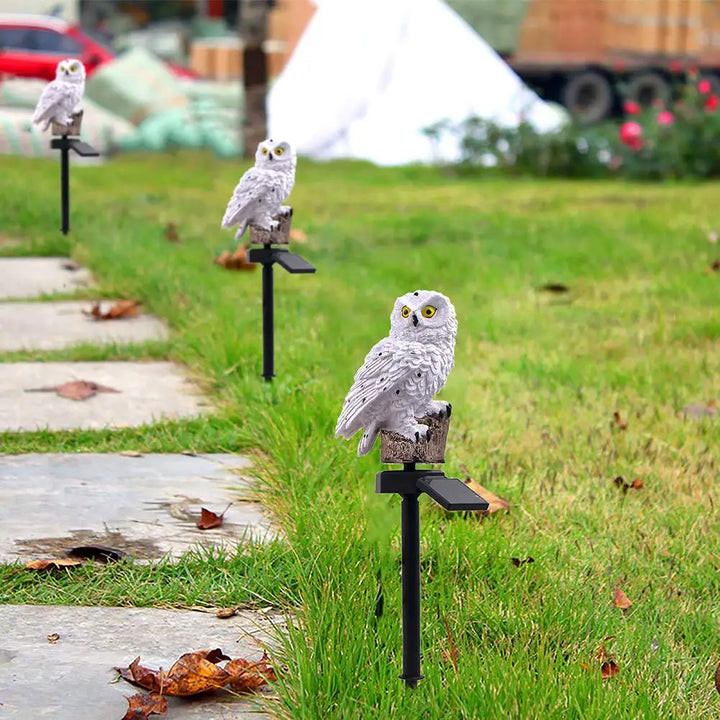 Whimsical solar powered owl LED light, excellent outdoor decor for gardens and pathways.