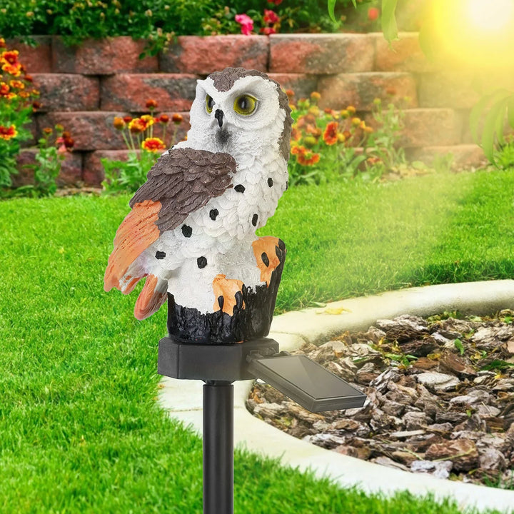 Unisex solar owl garden lamp, providing ambient light and charming animal decor.