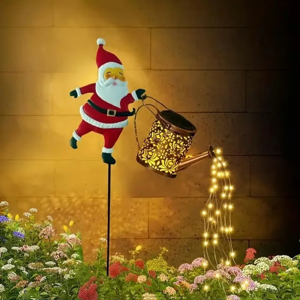 Whimsical Santa Claus kettle garden decor with glowing solar fairy lights for holiday lighting