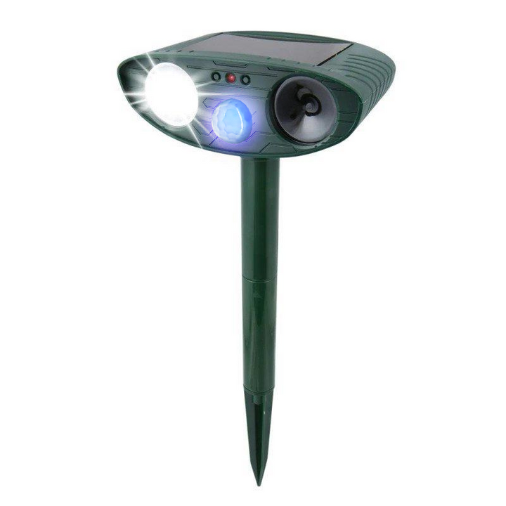 Solar ultrasonic rabbit repeller with flashing light for humane garden protection.