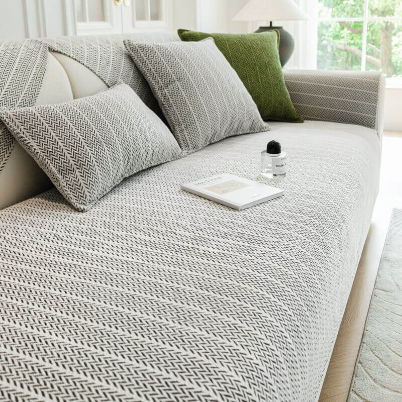 Solid color chenille sofa cover, anti-scratch and non-slip, protecting furniture from pets.