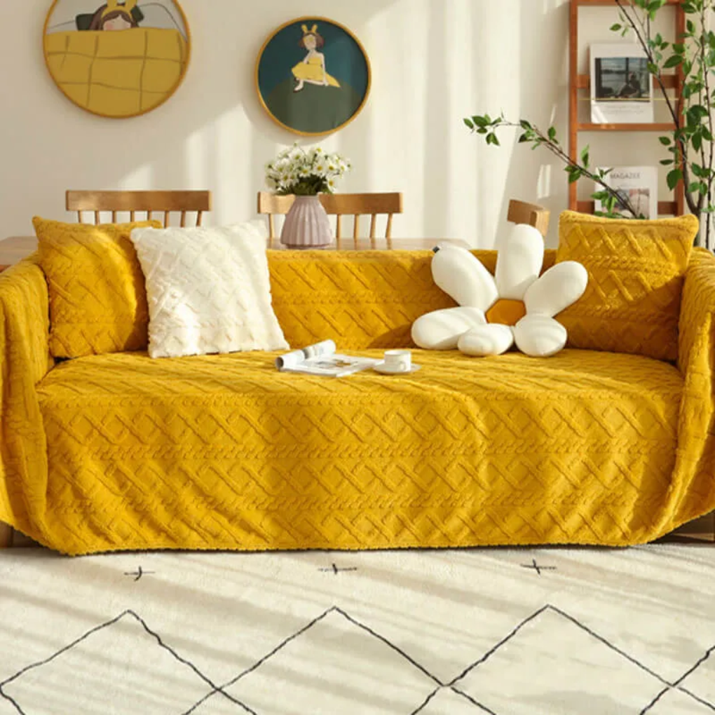 Soft fleece sofa cover in a solid brown, functions as a washable furniture protector blanket